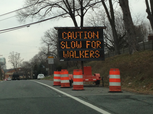 CAUTION SLOW FOR WALKERS